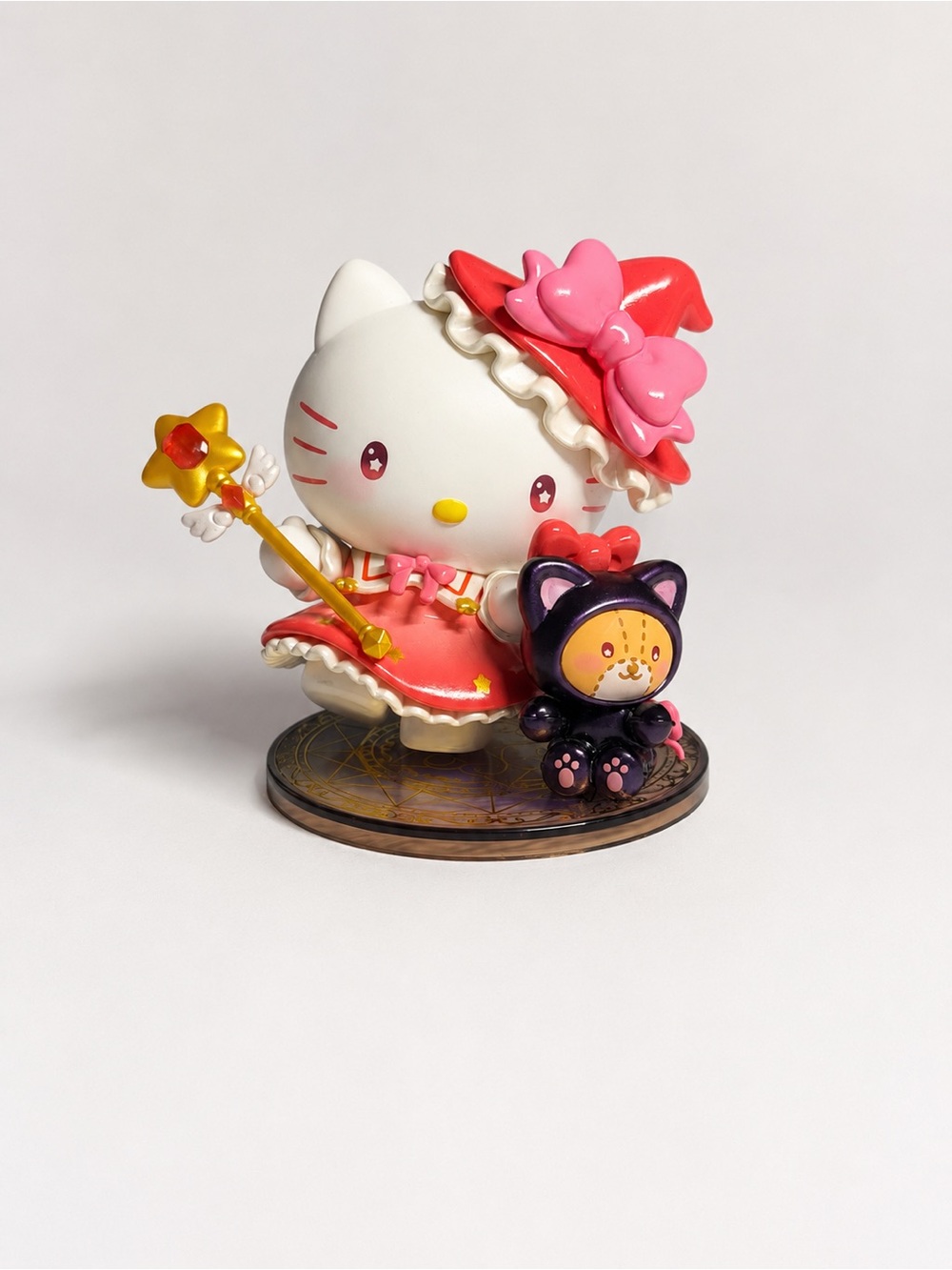 Hello Kitty Pink Witch Figurine with Yellow Star Wand